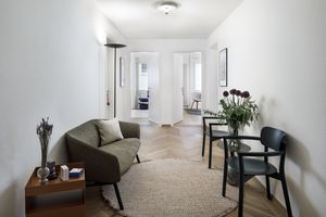 Bright and tranquil therapy office interior with comfortable seating and natural light